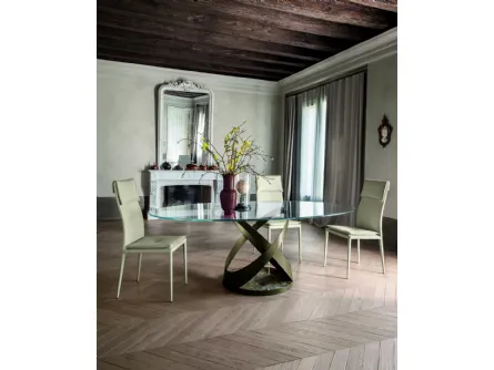 Tavolo rotondo con struttura in metallo e base in marmo con top in vetro di Tonin Casa