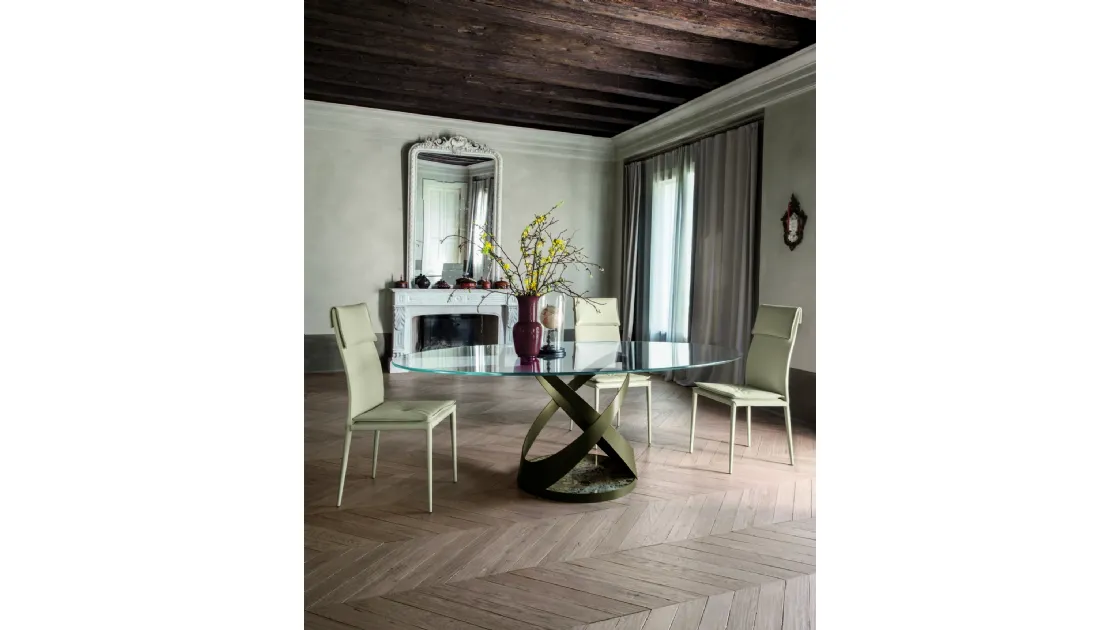 Tavolo rotondo con struttura in metallo e base in marmo con top in vetro di Tonin Casa