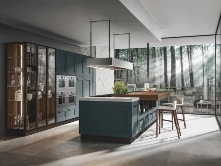 Cucina con imponente isola centrale con tavolo in legno Boston 6 di Home Cucine