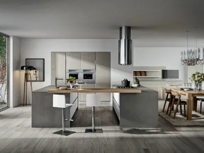 Cucina con isole centrali unite da un tavololo in legno Cartesia 4 di Home Cucine