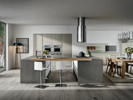 Cucina con isole centrali unite da un tavololo in legno Cartesia 4 di Home Cucine